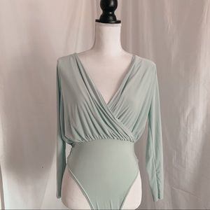 Baby blue long sleeve body suit NWT